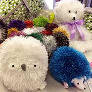 Charming sparkly toys and the patterns to knit them with Tinsel Chunky at Victoria Fabrics.